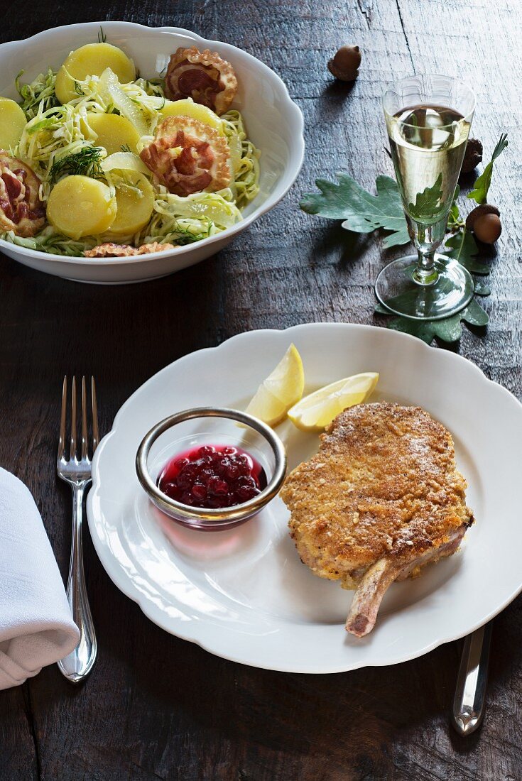 Breaded veal escalope with a potato and pointed cabbage salad
