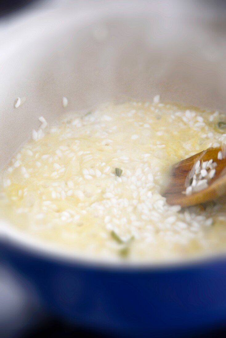 Risotto rice being cooked in stock