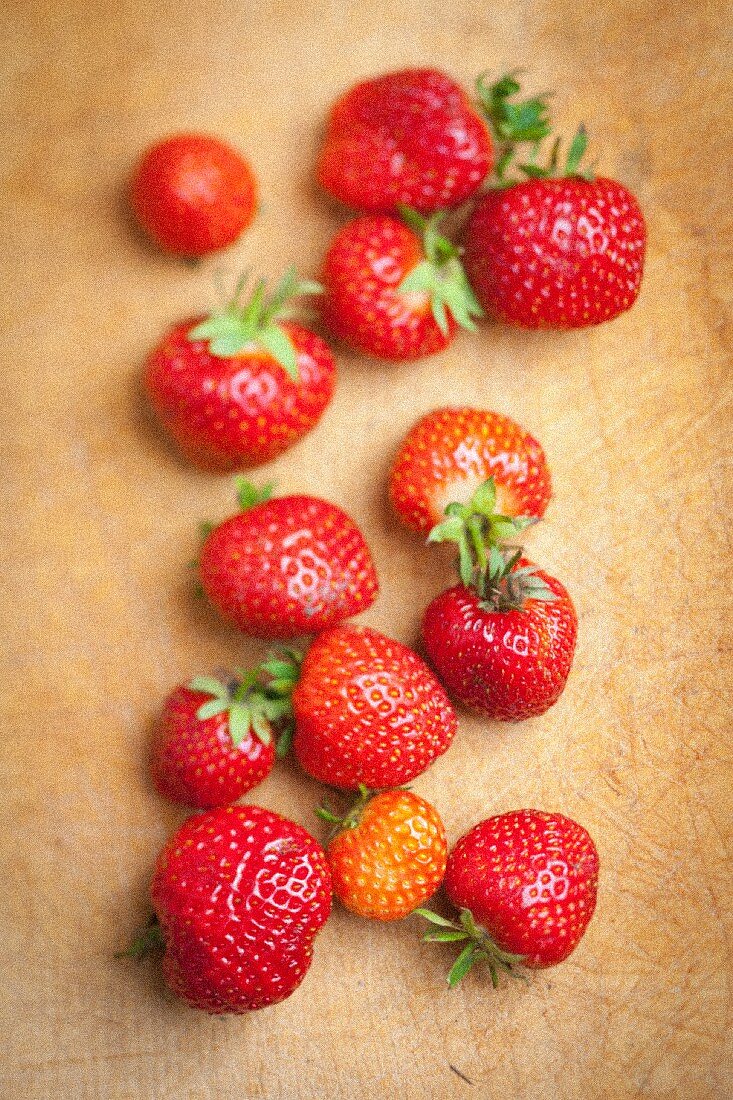 Fresh strawberries on a wooden board