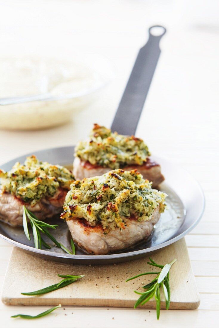 Medallions of pork with a herb crust