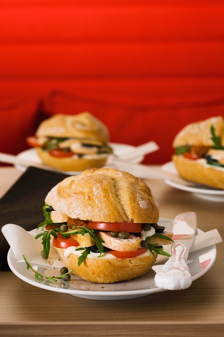 Chicken burger with mozzarella and tomatoes