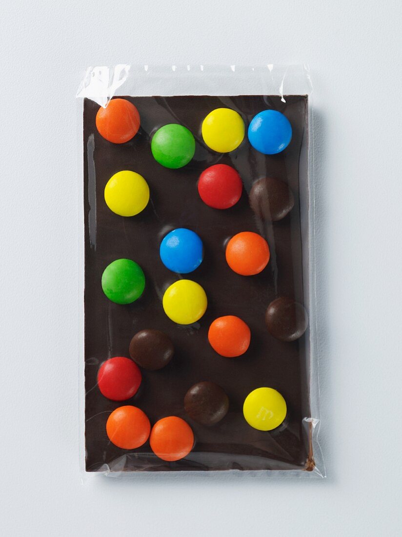 Zoe's Chocolates; A Piece of Chocolate with Colorful Candies