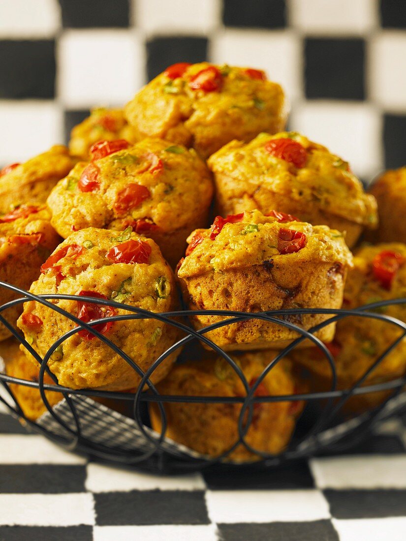 Savoury muffins with cherry tomatoes, chillies and chives
