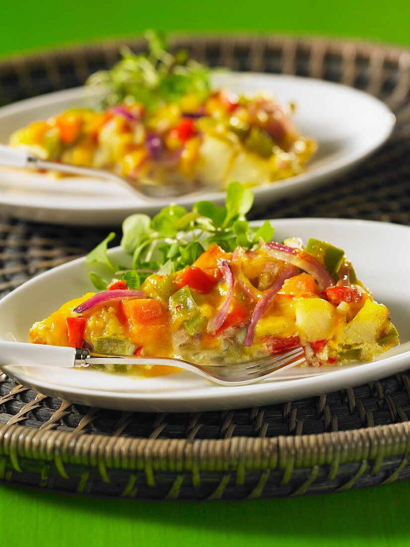 Potato tortilla with peppers and onions