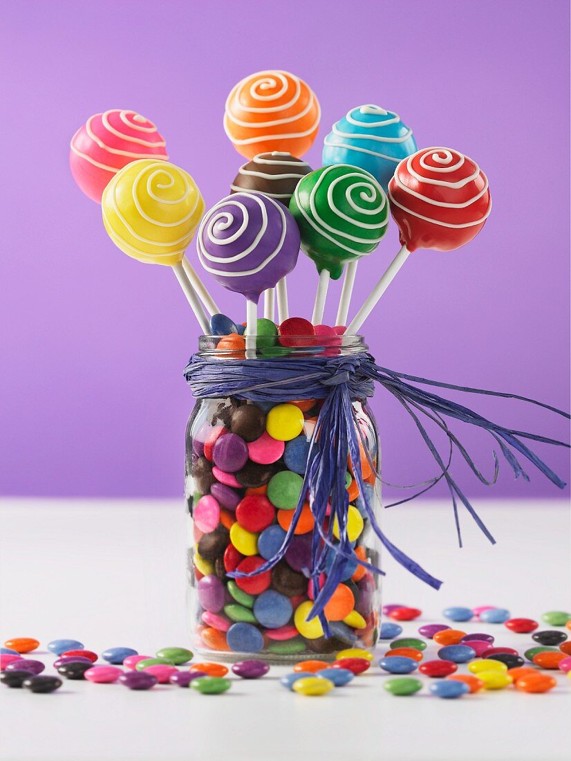 Colourful cake pops and chocolate beans