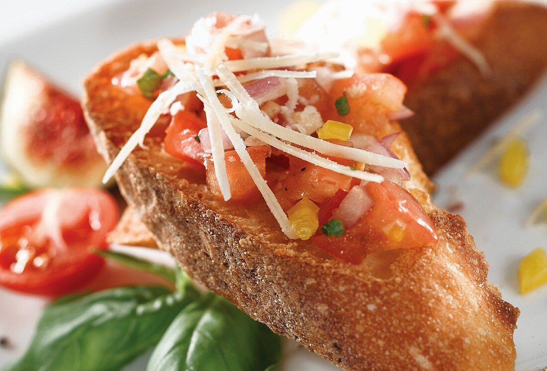 Tomato and pepper bruschetta with parmesan