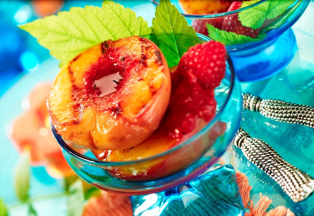 Grilled peach with raspberries