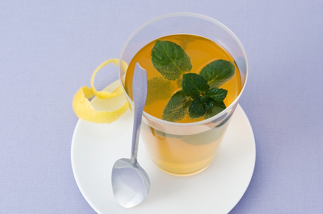 Iced tea with mint and lemon peel
