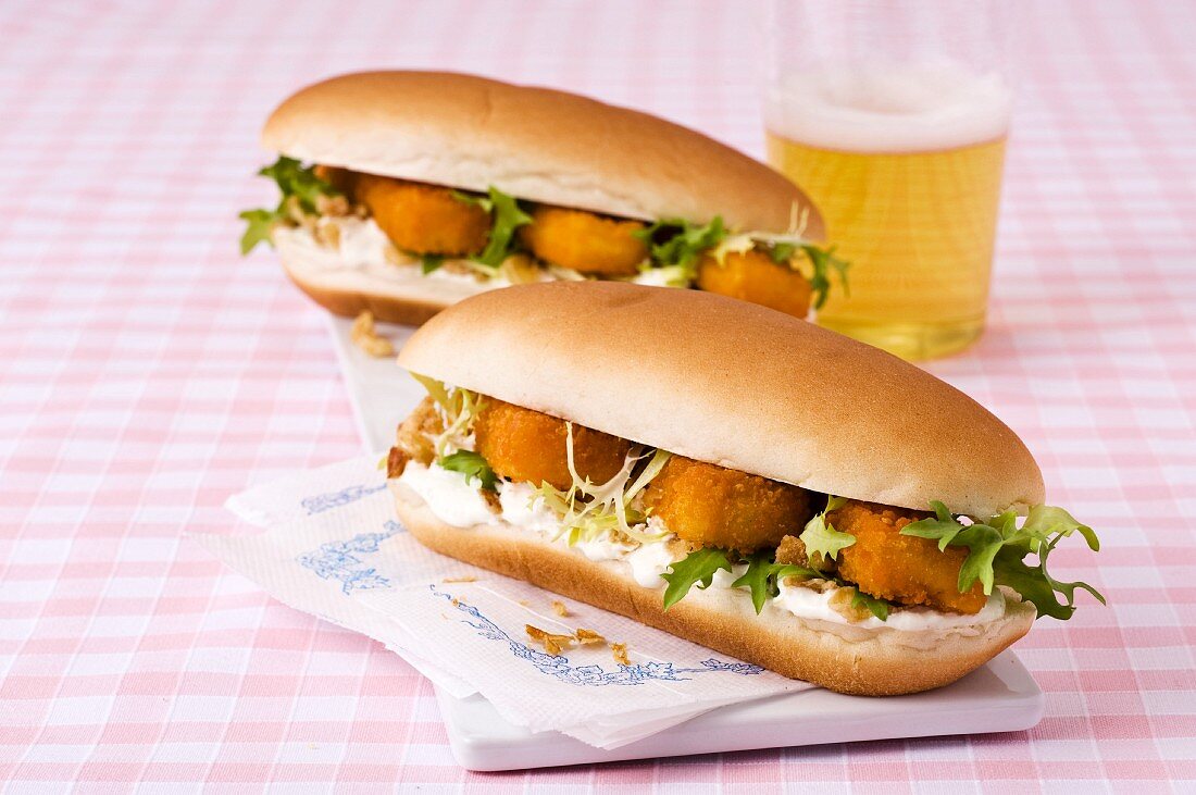 Fish fingers in hot dog rolls