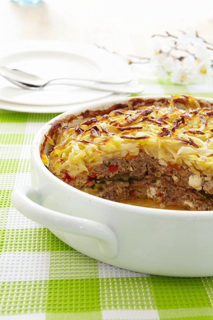 Meatloaf topped with cheese and grilled in the oven