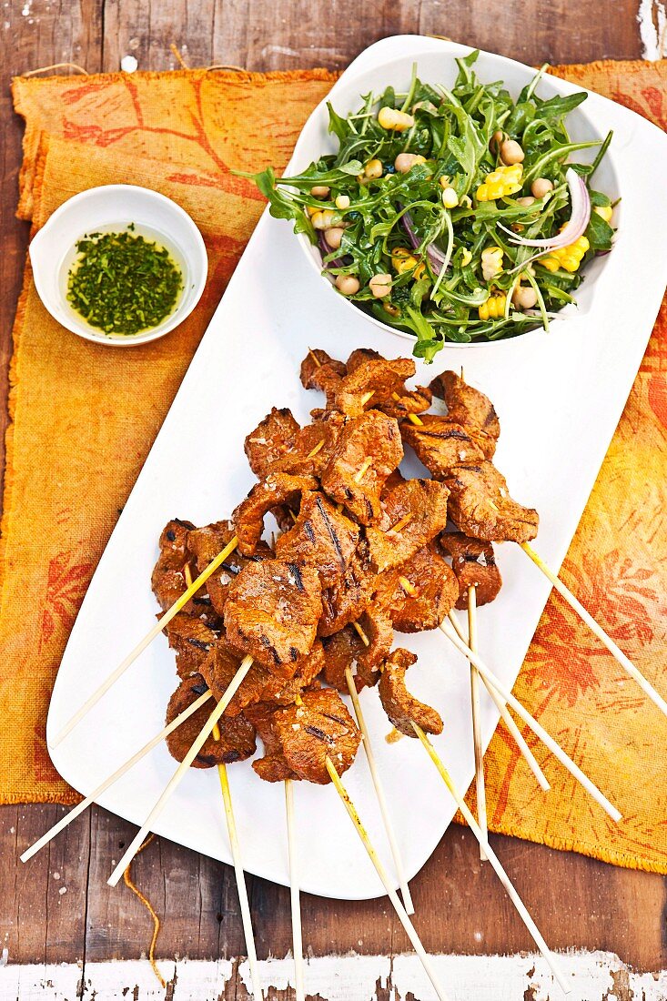 Moroccan lamb skewers with a rocket salad