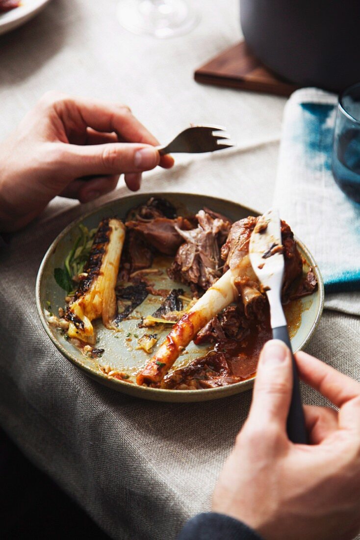 Remains of leg of lamb with fried leek