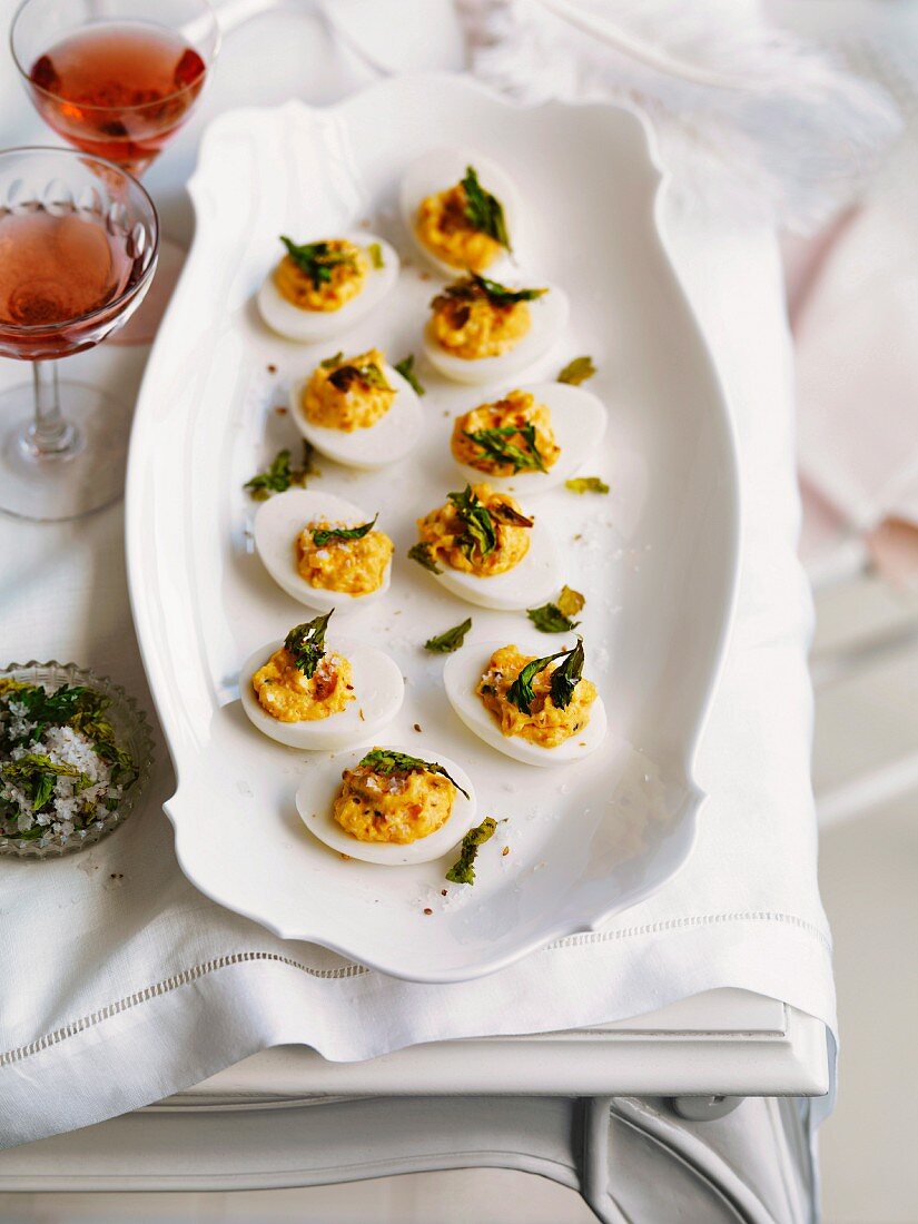 Devilled eggs with celery and coriander salt