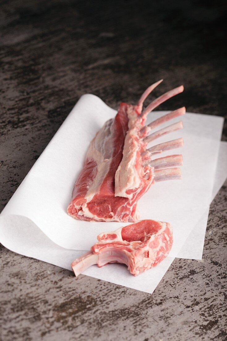 Rack of lamb on baking parchment