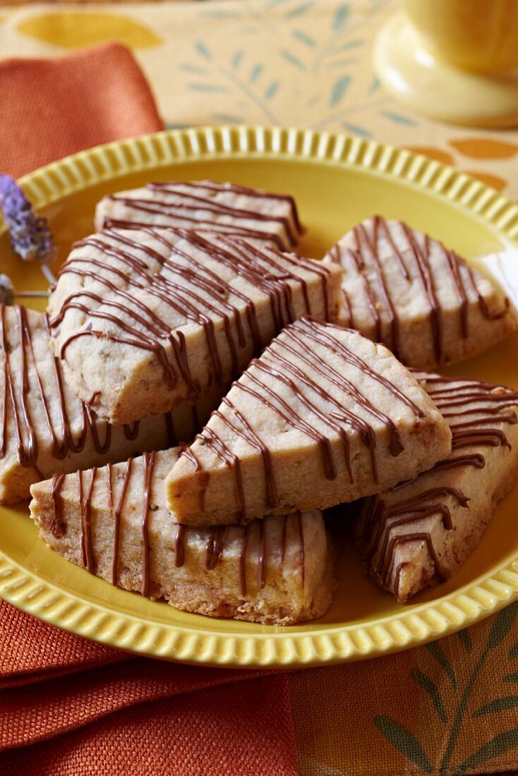 Chocolate Drizzled Blondies Cut into Triangles