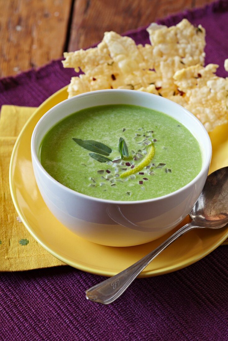 A Bowl of Spring Pea Soup with Cheese Crisps