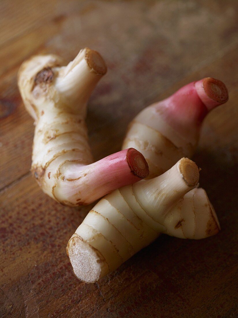 Two galangal roots