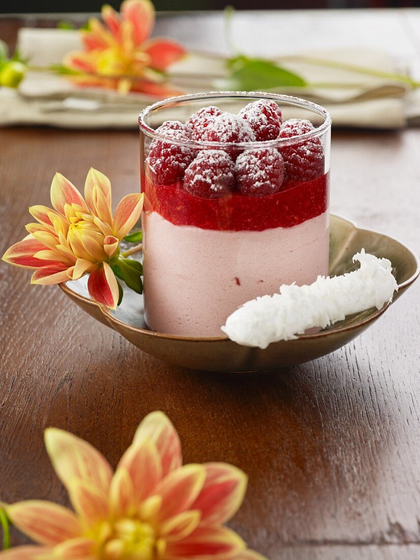 Raspberry and marzipan dessert served with coconut meringue