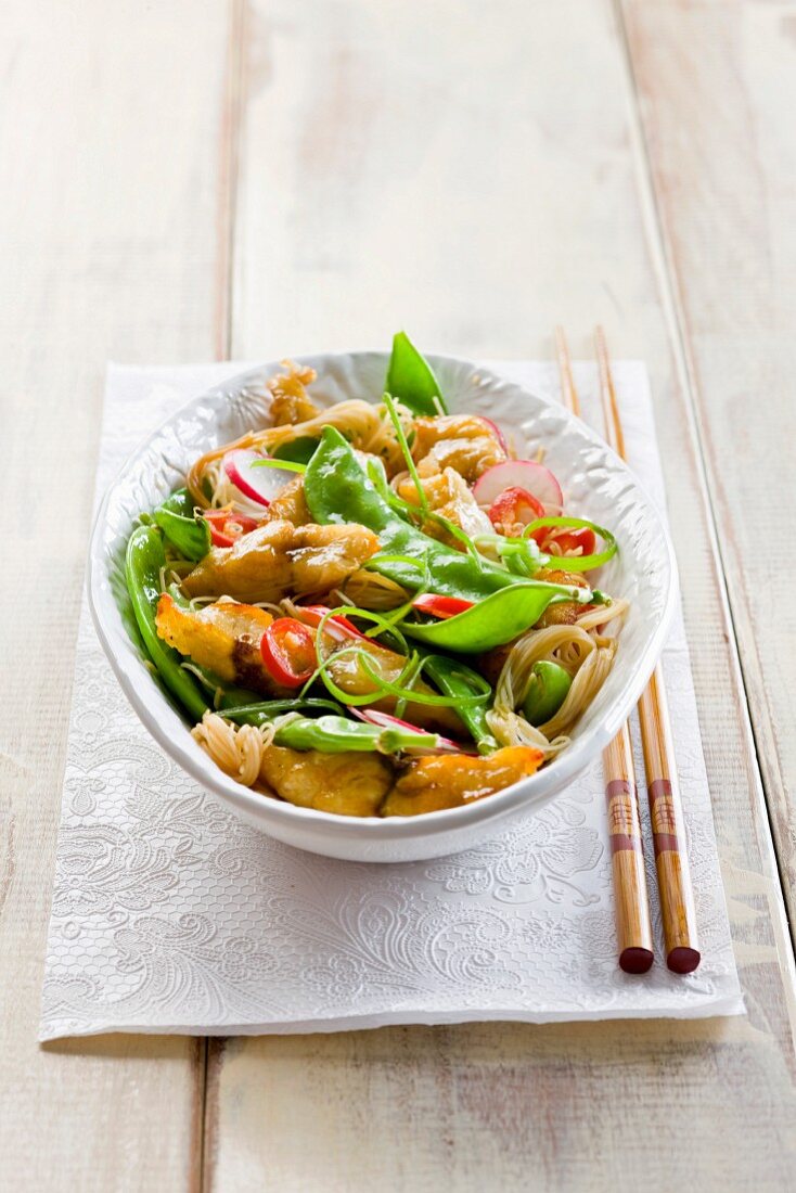 Chicken stirfry with sugar snap peas and noodles