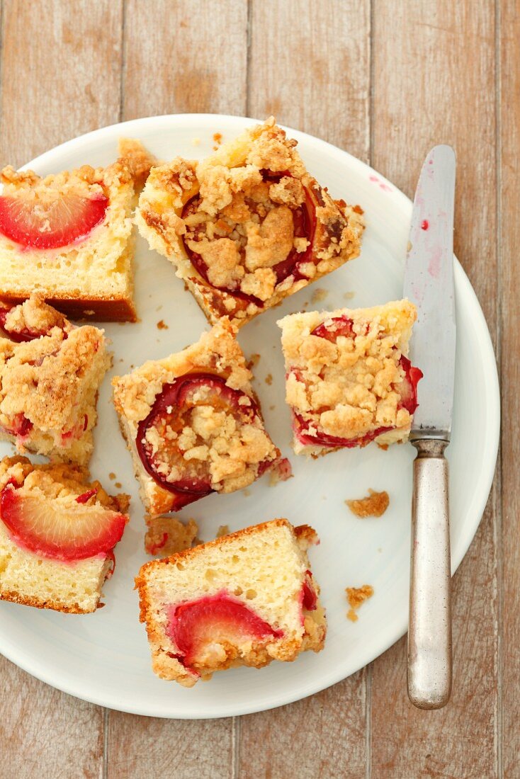 Plum crumble cake, cut into portions