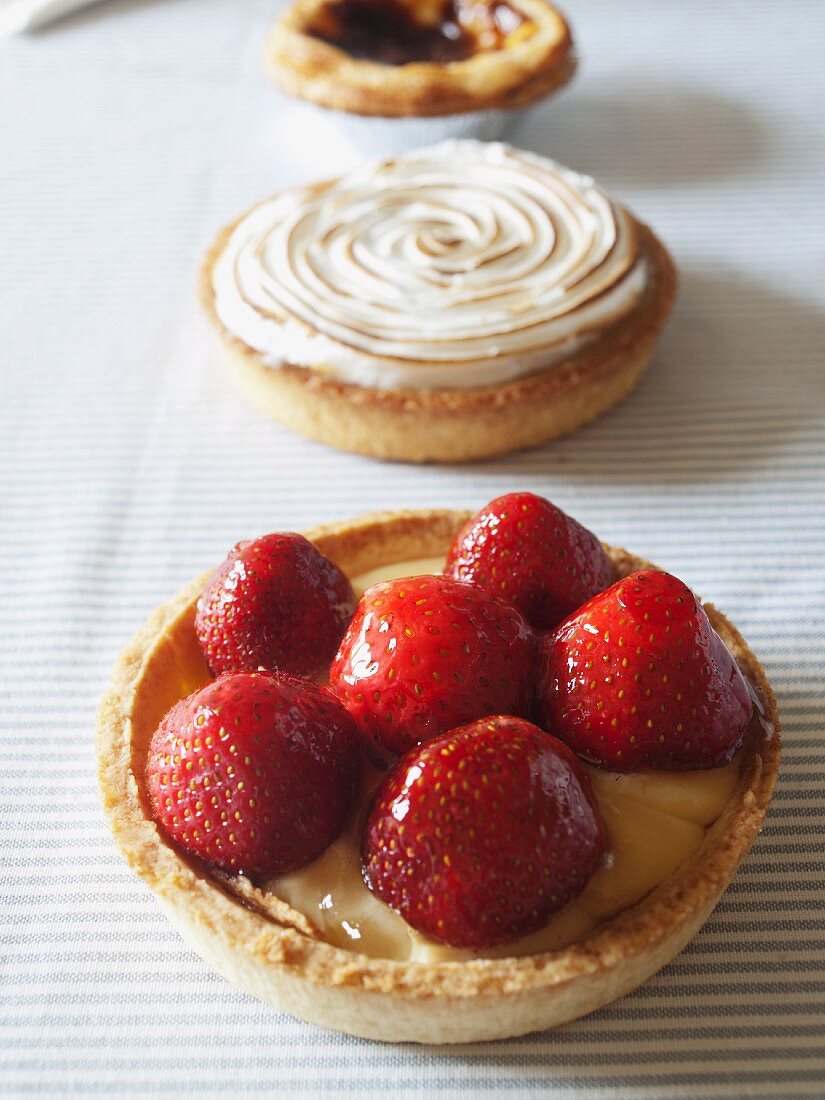 Three custard tarts