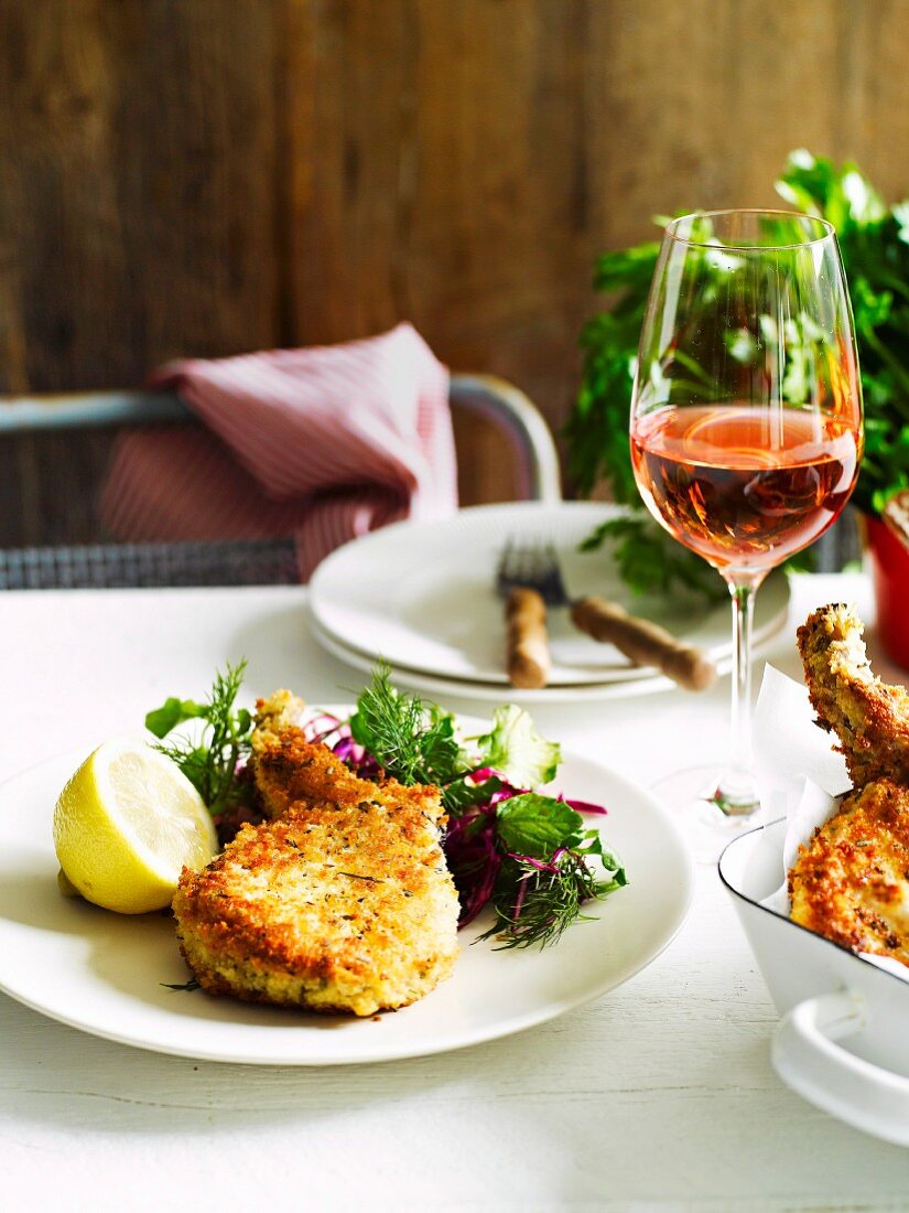 Breaded pork chops with a fennel and dill salad