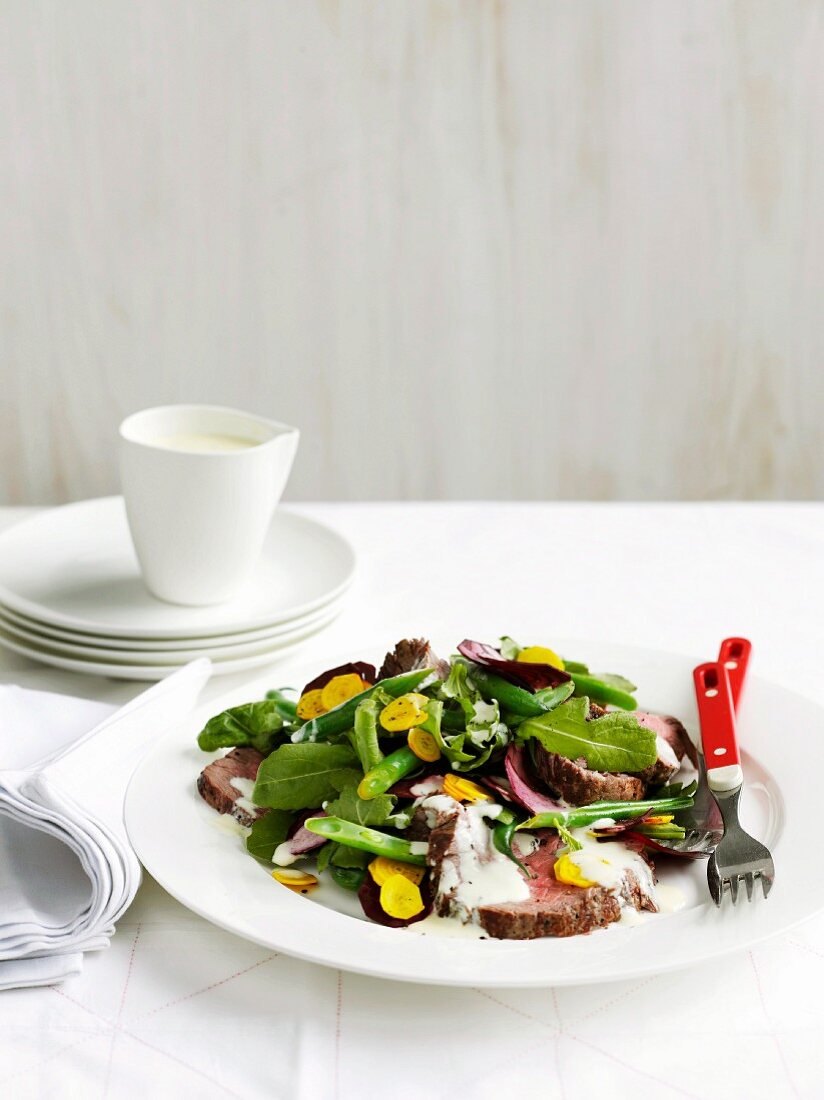 Roast beef salad with beetroot, wasabi leaves and buttermilk dressing