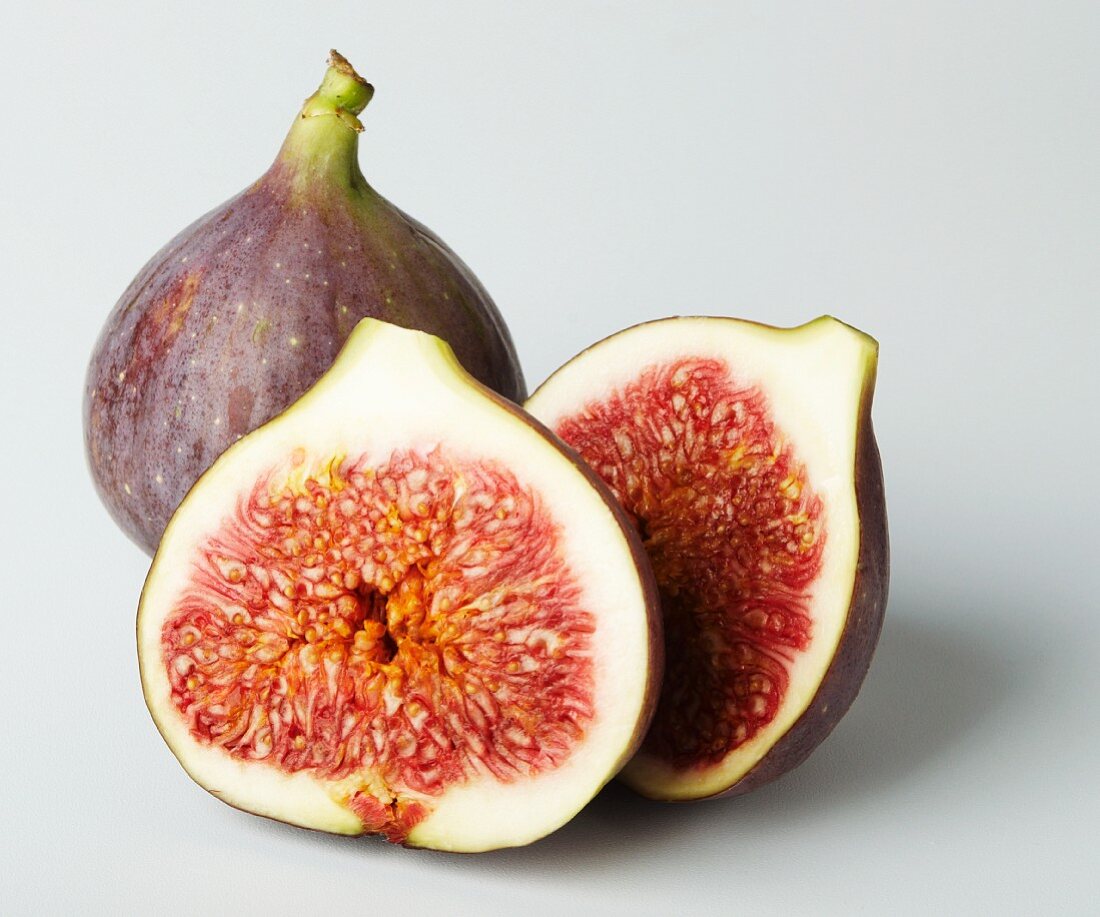 Two half figs and a whole fig