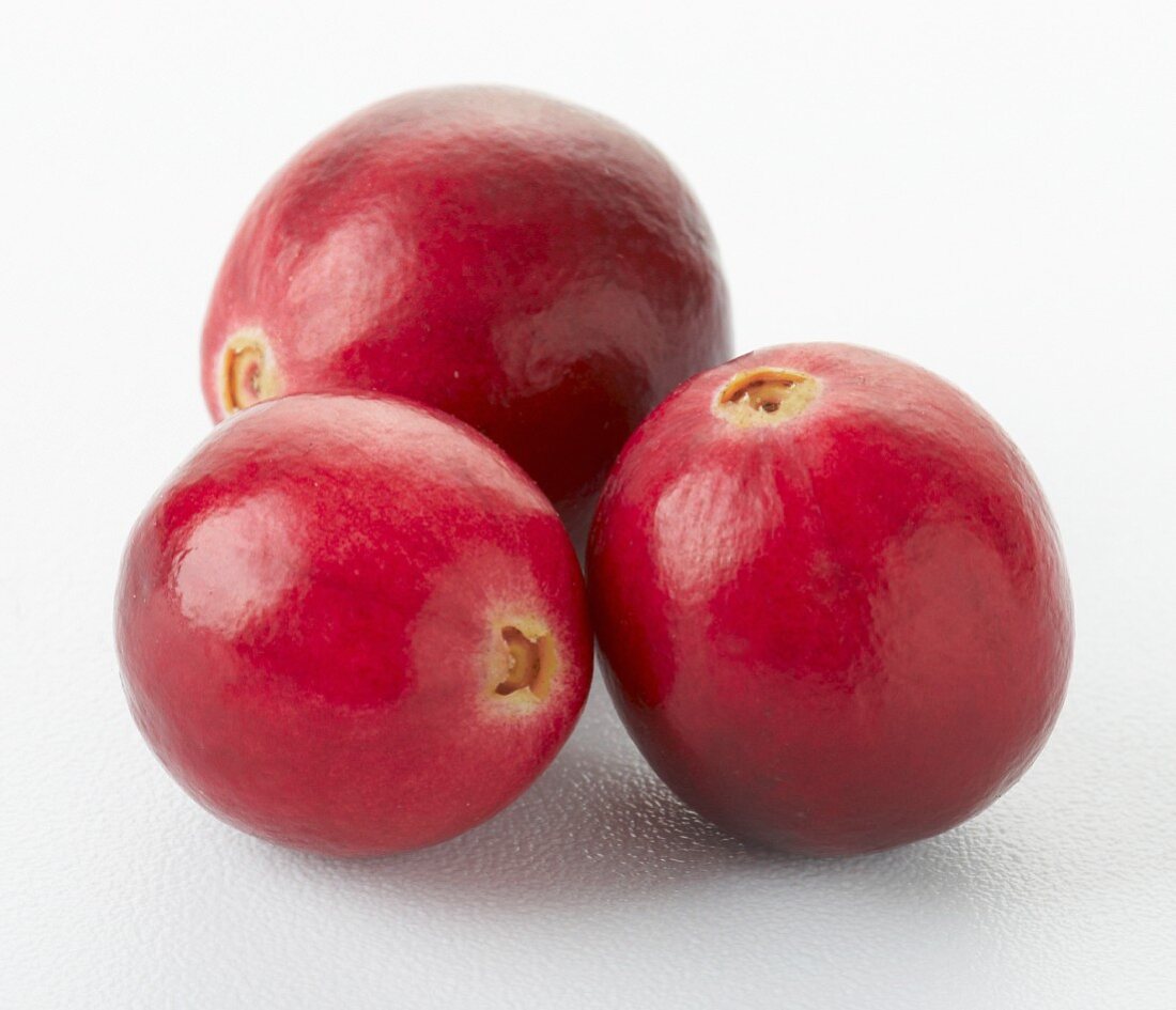 Three cranberries (close-up)