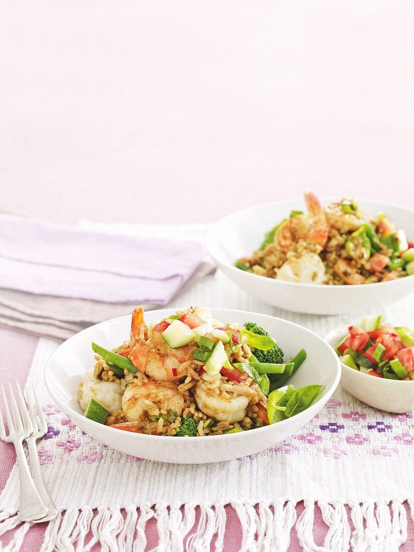 Prawn curry with fried rice and a tomato & cucumber salad