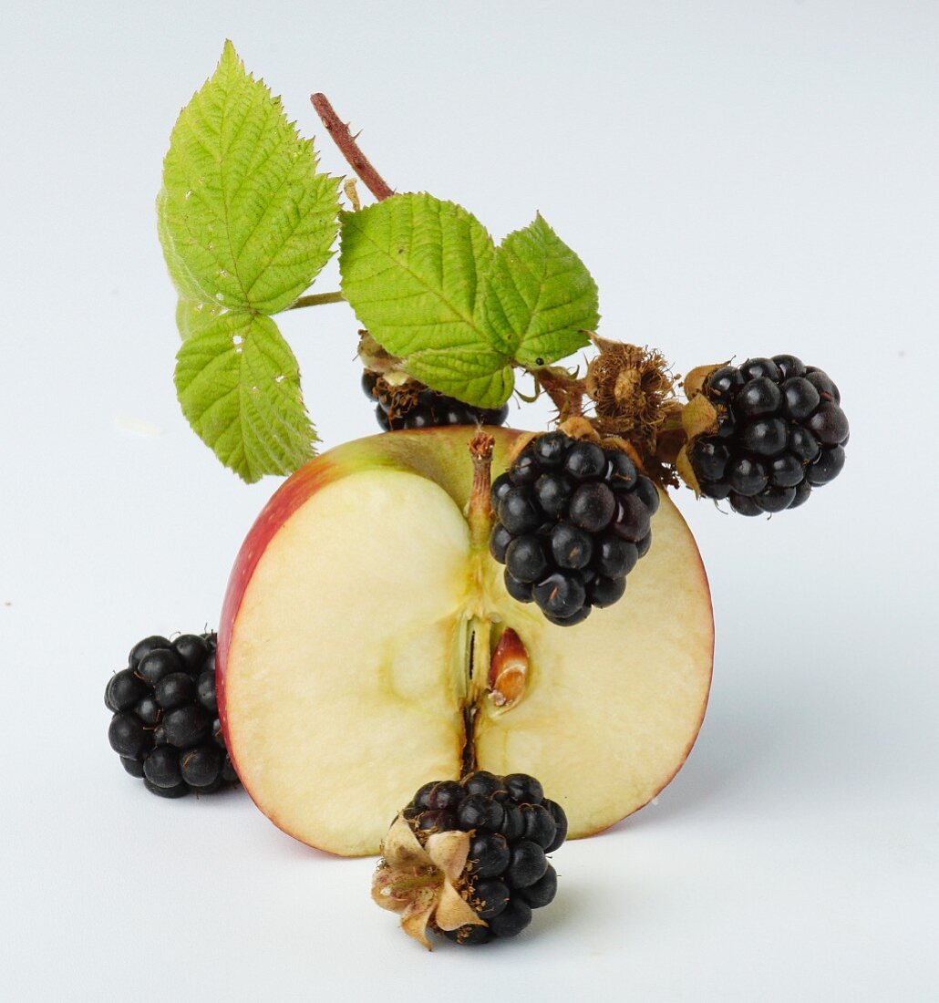 Small blackberries and half an apple