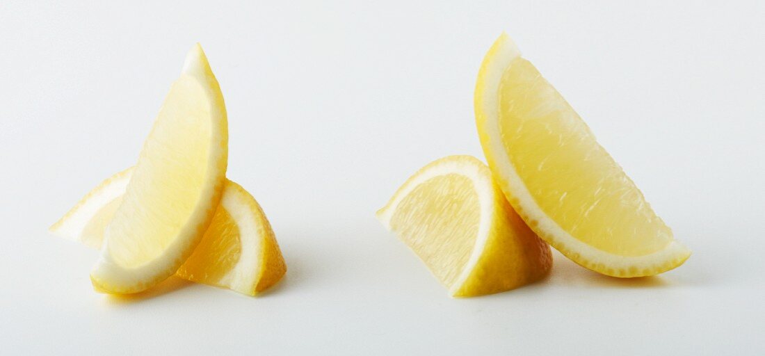 Lemon Wedges in a Small Dish on Green Napkin