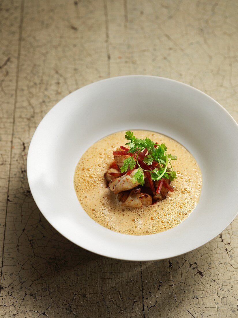 Deep-fried squid in prawn foam with coriander