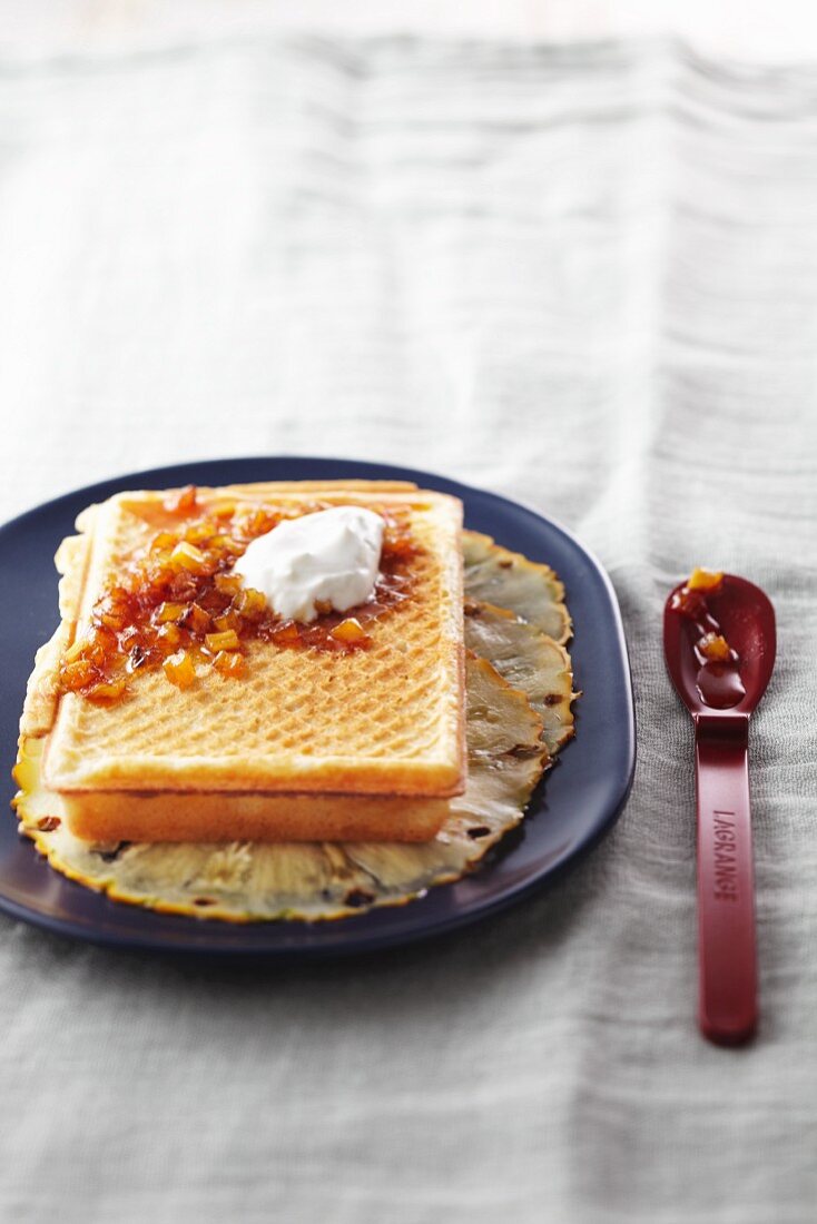 A waffle with caramelised pineapple slices