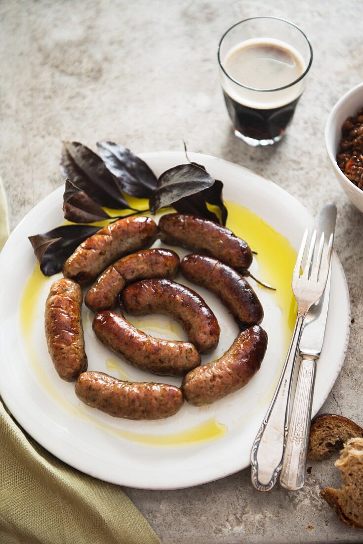 Fried sausages, bread and beer