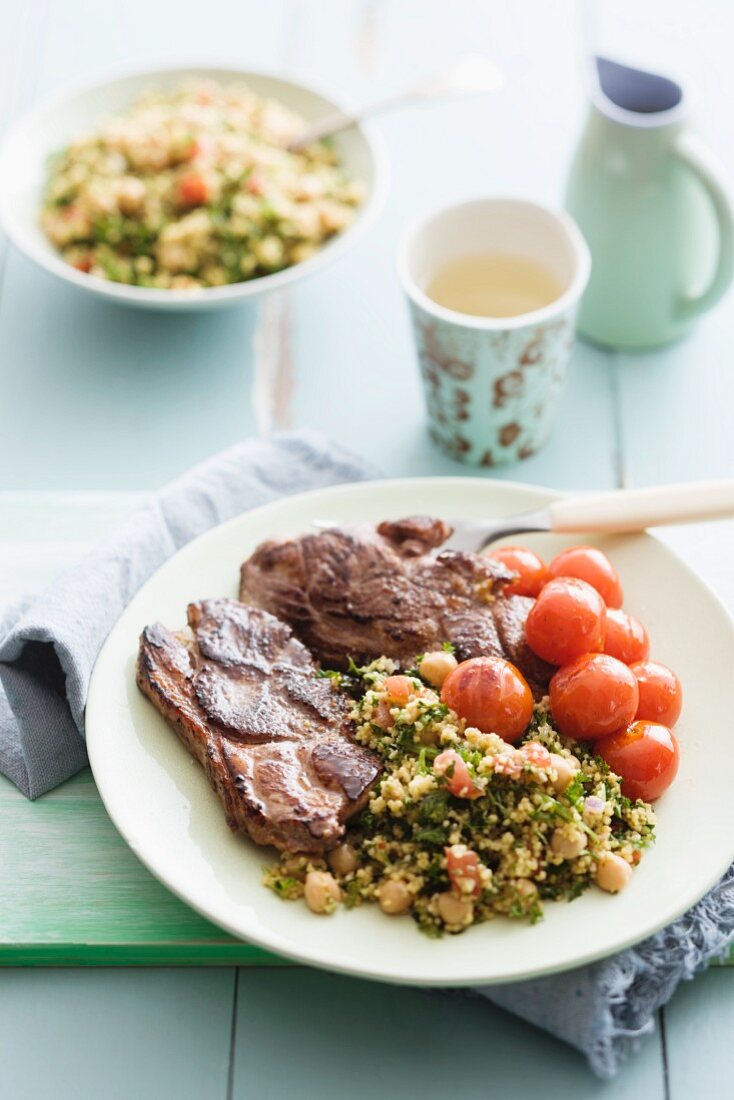 Lamb with tabbouleh and cherry tomatoes