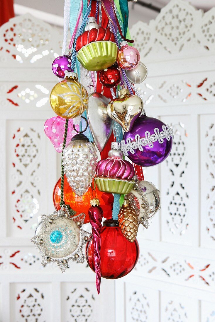 Christmas baubles hanging from ceiling