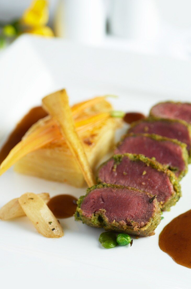 Lamb fillet with a herb crust and potato gratin