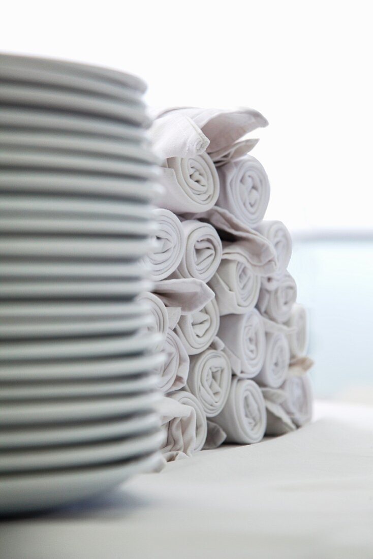White plates and napkins, stacked