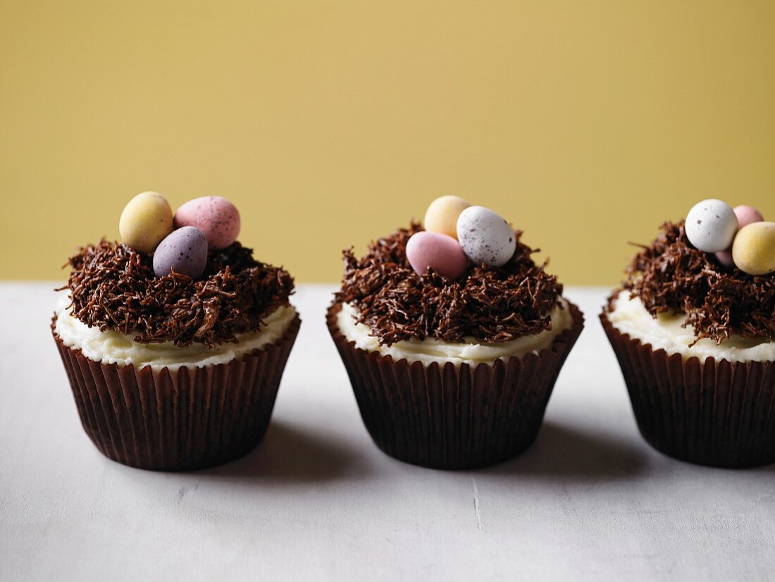 Chocolate cupcakes with sugar eggs for Easter
