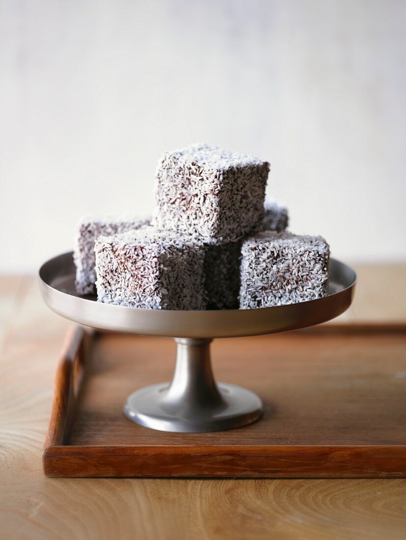 Lamingtons coated in grated coconut