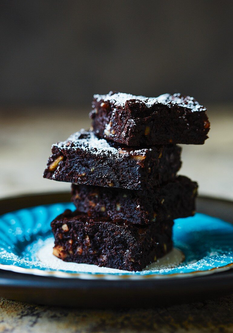 Dark chocolate brownies with walnuts, stacked