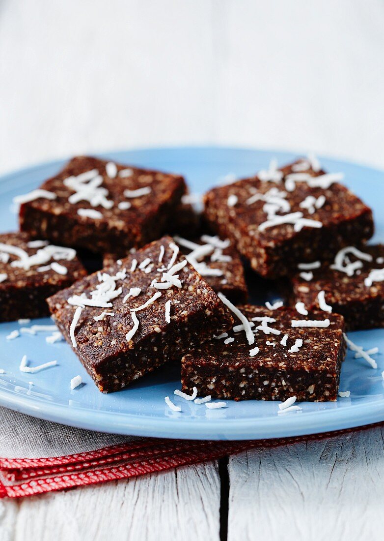Chocolate and coconut slices on a plate