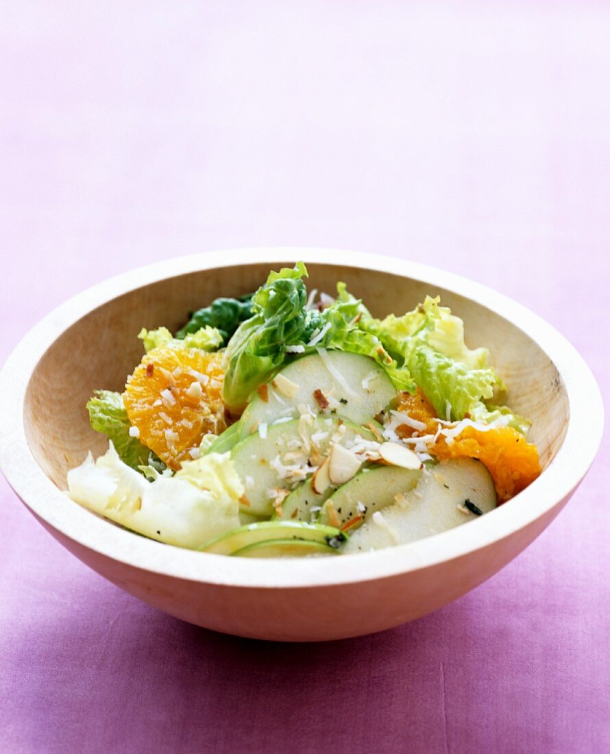 Coconut and tangerine salat with green apples