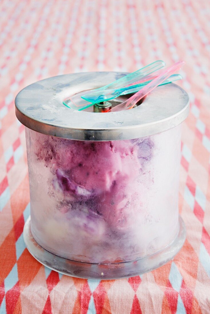 Mixed ice cream in the jar with a lid