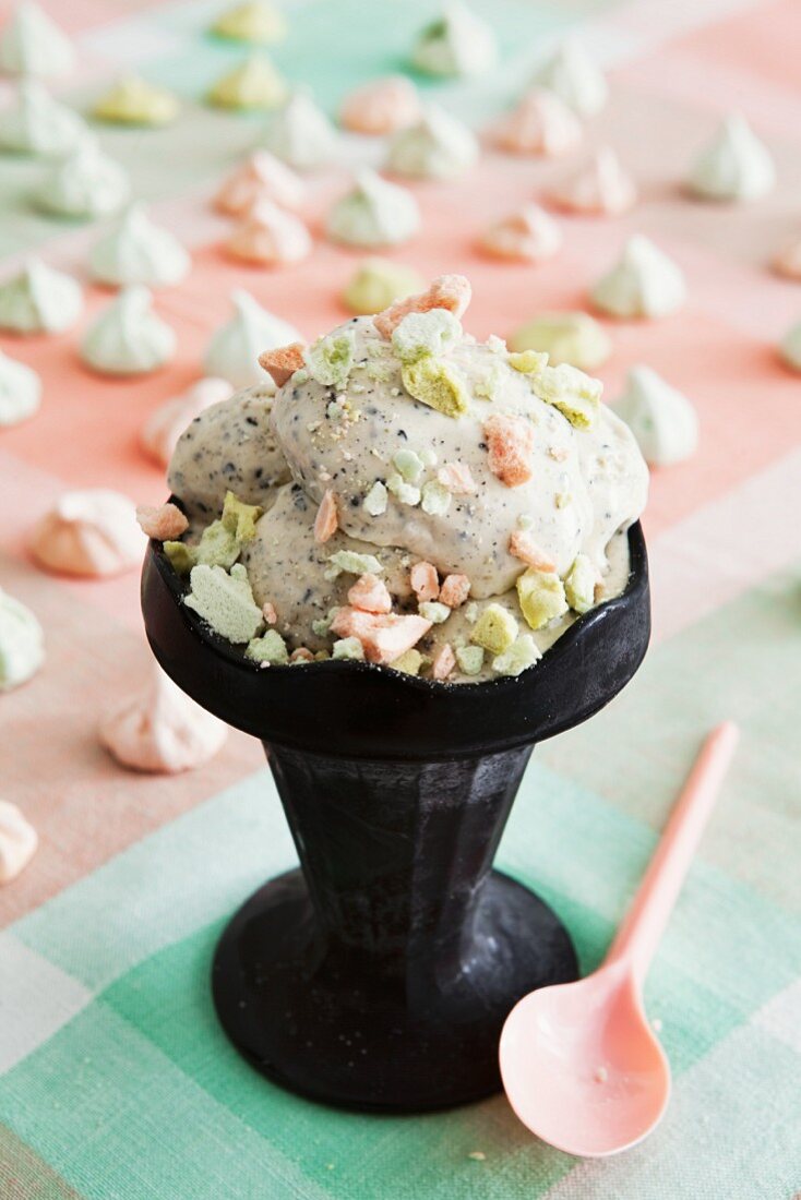 Sesame seed ice cream with pastel coloured meringue dots