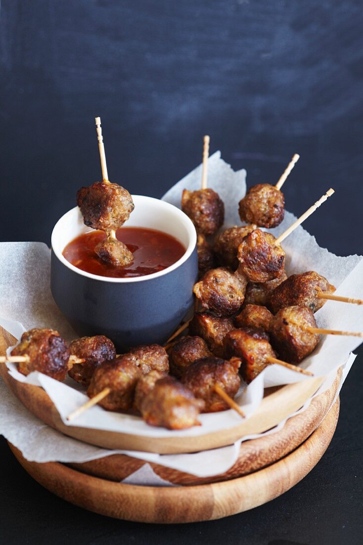 Meatball skewers with chilli dip