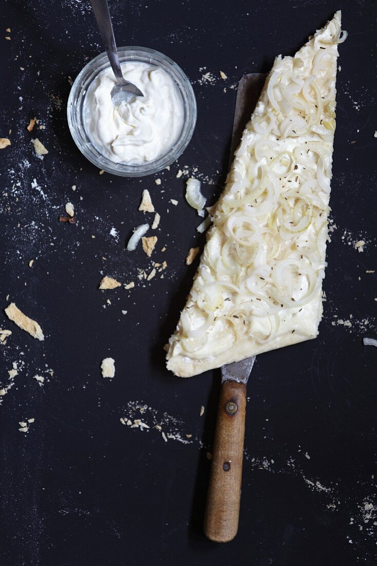 A slice of onion tart with quark