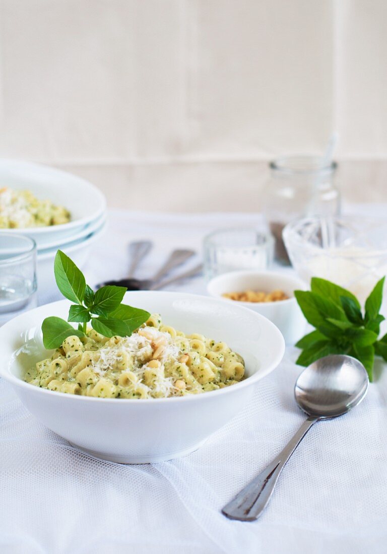 Macaroni with pesto and pine nuts