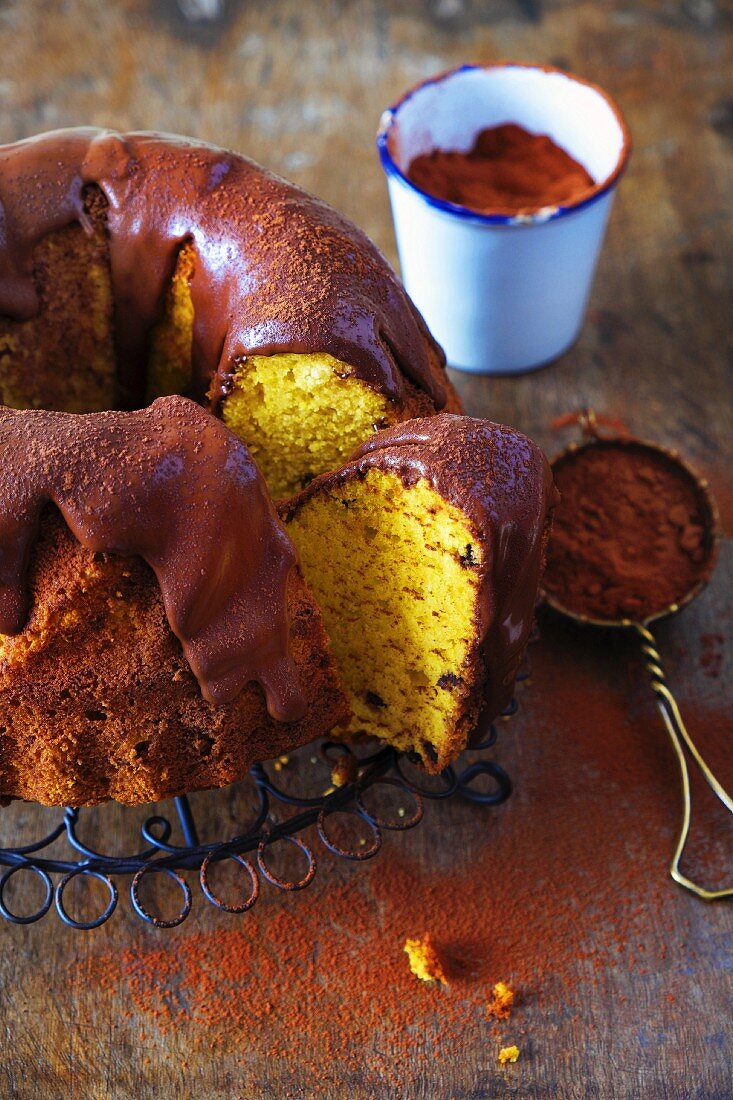 Saffron cake with chocolate coating and cocoa powder